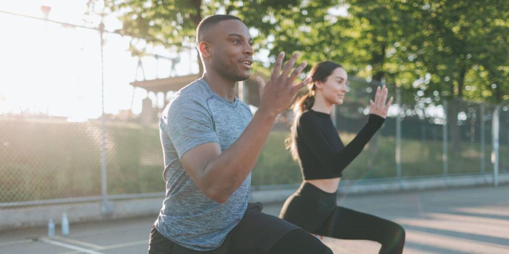 couple working out in the park