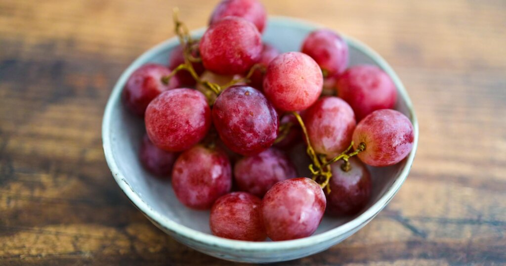 Grapes in a bowl on a table