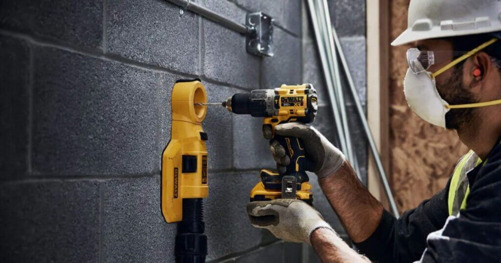 DeWalt 20V Max being used to drill a hole in concrete