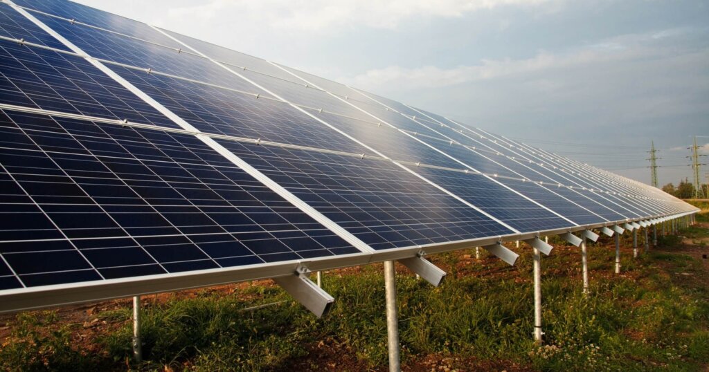 Solar panels in a field from the Three Rivers Maine Solar Energy Project.