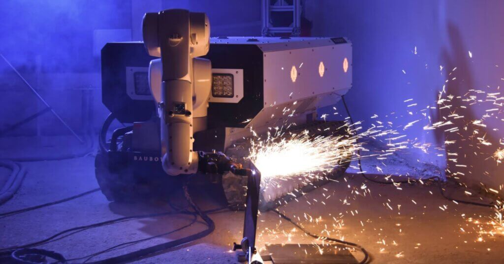 Baubot by Printstones cutting a metal pipe