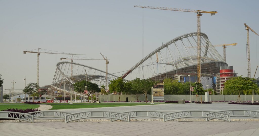DOHA, QATAR -22 DEC 2016- Construction of the Khalifa International Stadium in the Aspire Zone complex near the Torch Doha. Qatar will host the 2022 FIFA World Cup of soccer.