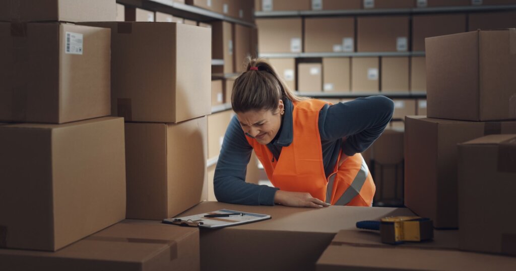 factory worker with lower back pain