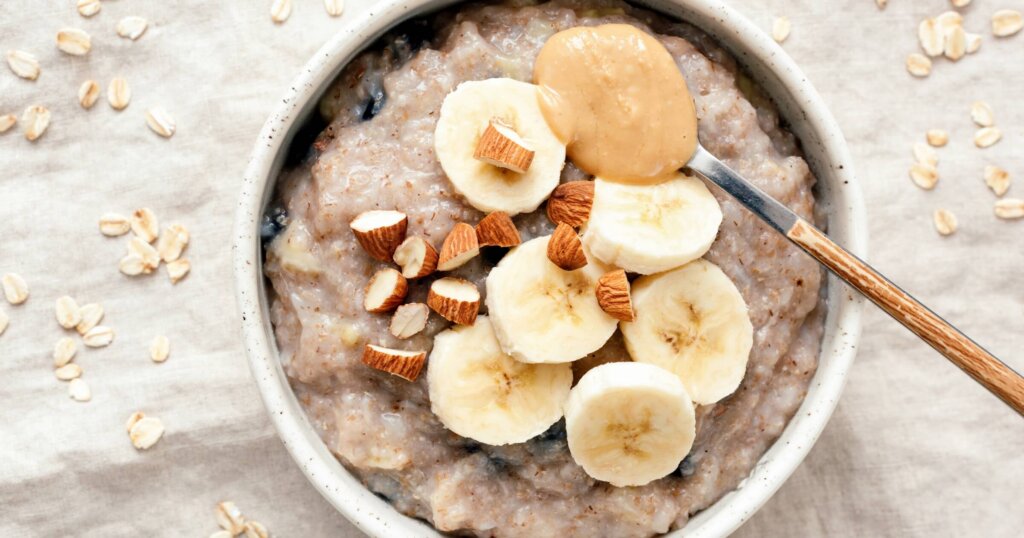 Oatmeal with almond butter, sliced banana, and protein powder