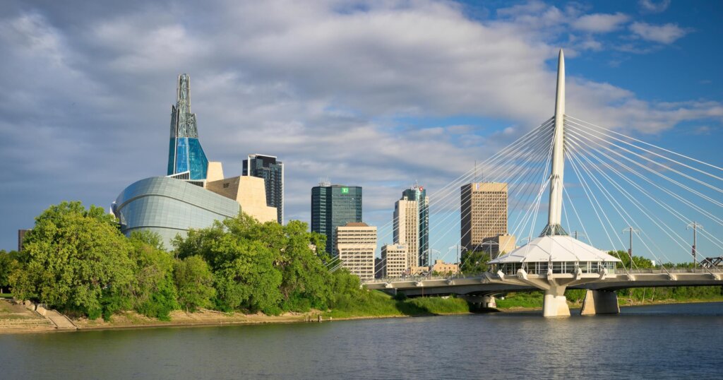 WINNIPEG, MANITOBA, CANADA - AUGUST 9, 2023: Winnipeg skyline from across the Red River in Winnipeg