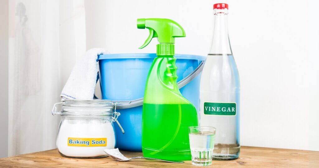 Low angle view of baking soda with vinegar, natural mix for effective house cleaning.
