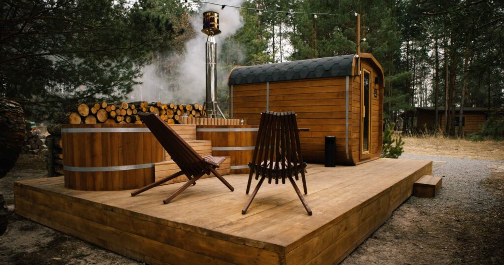 Outdoor wooden sauna and hot pot chilling zone