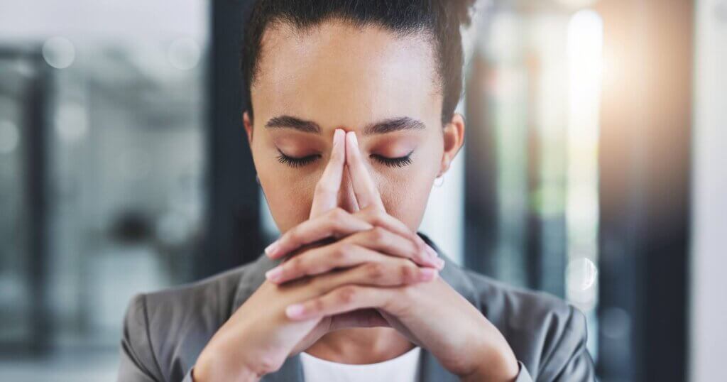 Anxiety, stress or business woman in office with headache, nervous or overthinking mistake, report or laptop feedback. Vertigo, fear or entrepreneur at startup overwhelmed by review, disaster or fail