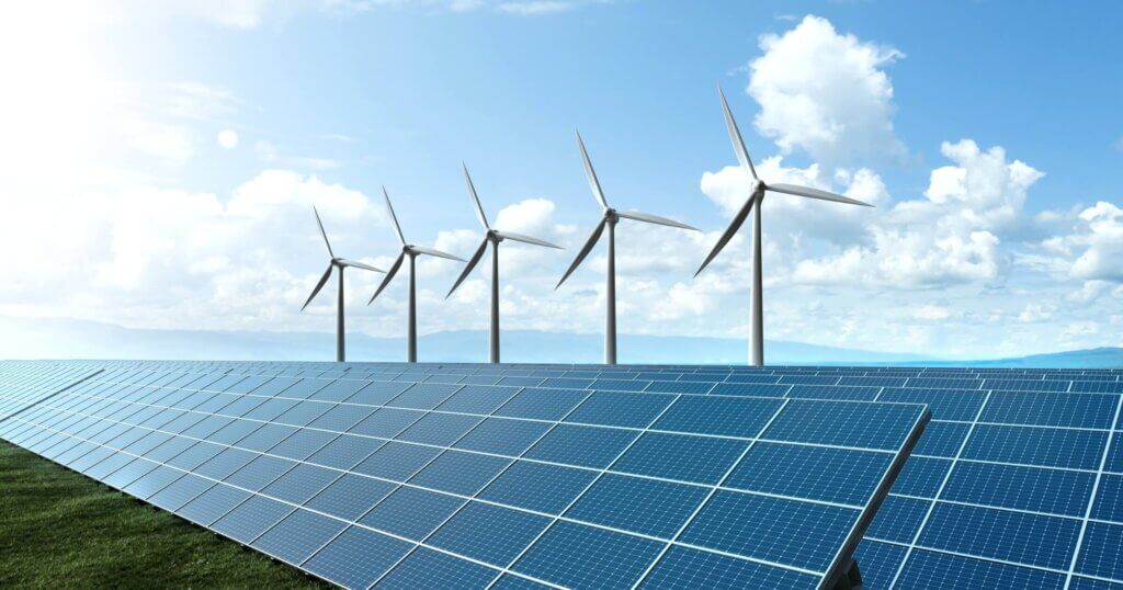 serene solar farm and towering wind turbine stand in lush green fields against a pristine blue sky, for clean energy, sustainable future, eco-friendly and renewable energy concept.