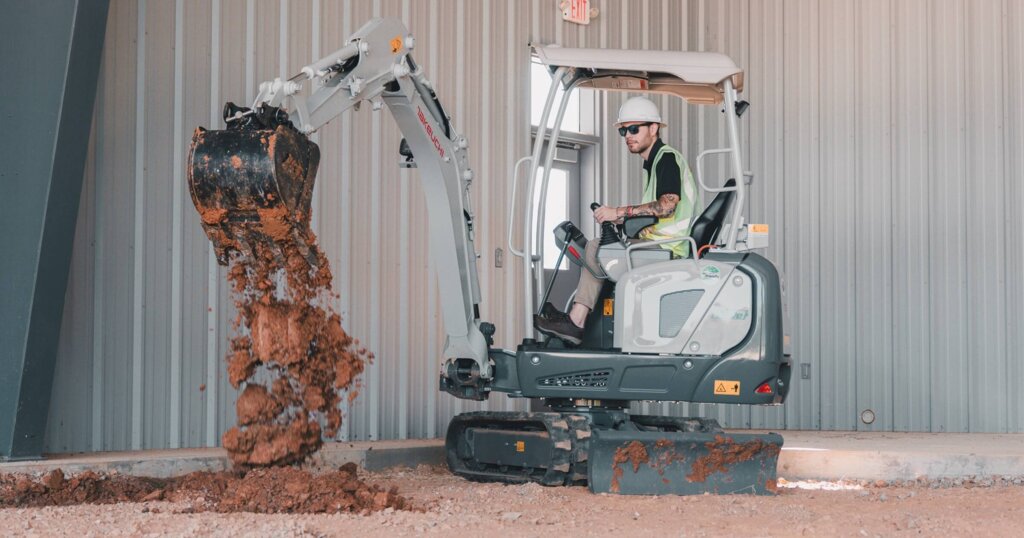 Takeuchi electric excavator TB20e model at work