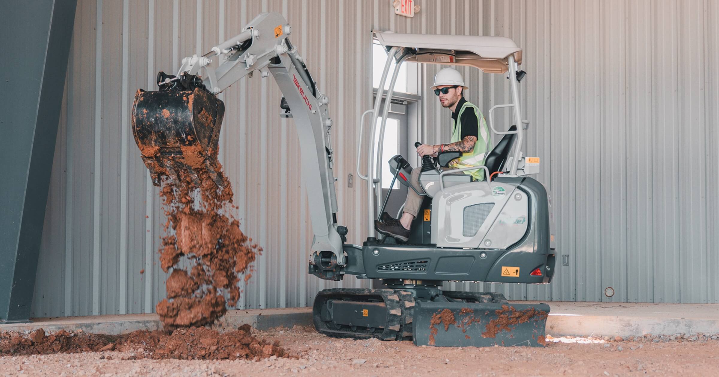 Takeuchi electric excavator TB20e model at work