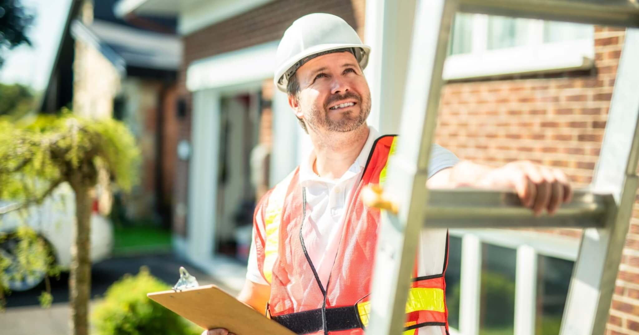 a safety officer performing a ladder safety inspection