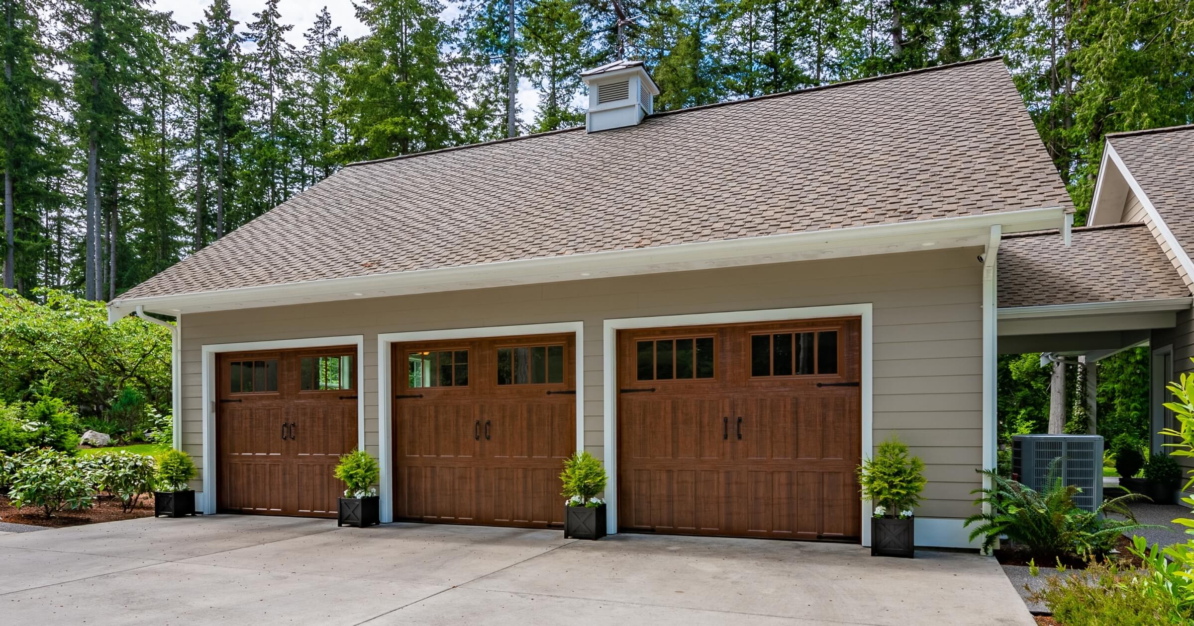 craftsman style home three car garage