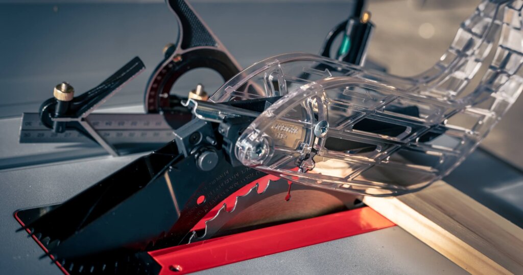 A piece of wood ready to be cut by table saw