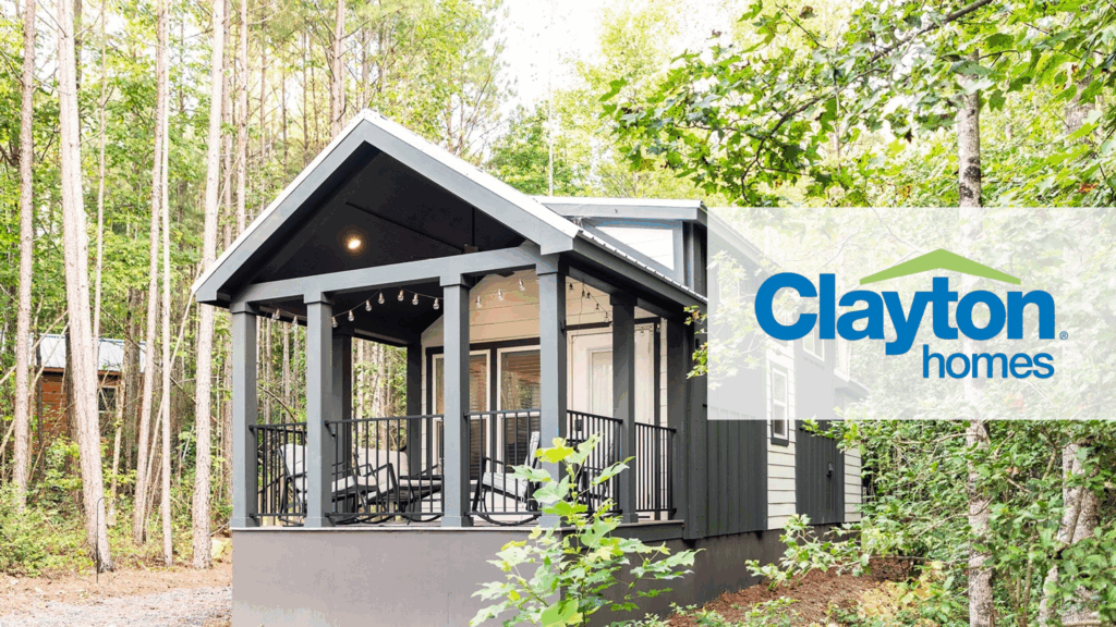 Clayton Homes with small grey model tiny home