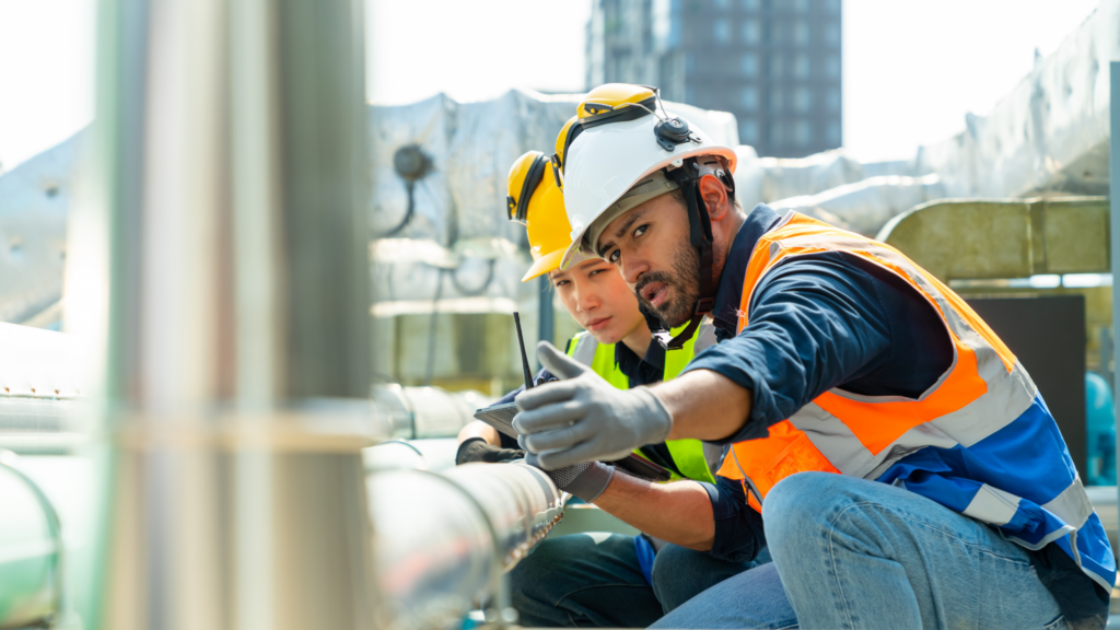 Mentoring programs in the workplace: Purpose, benefits, and how to build one that works 1 Male engineer mentoring woman on job site