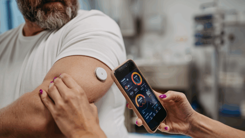 Man wearing continuous glucose monitor