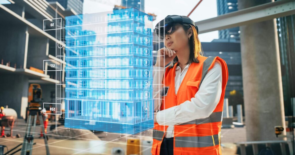 Female Architect Wearing an Augmented Reality Headset and Inspecting a Digital Hologram of a Building