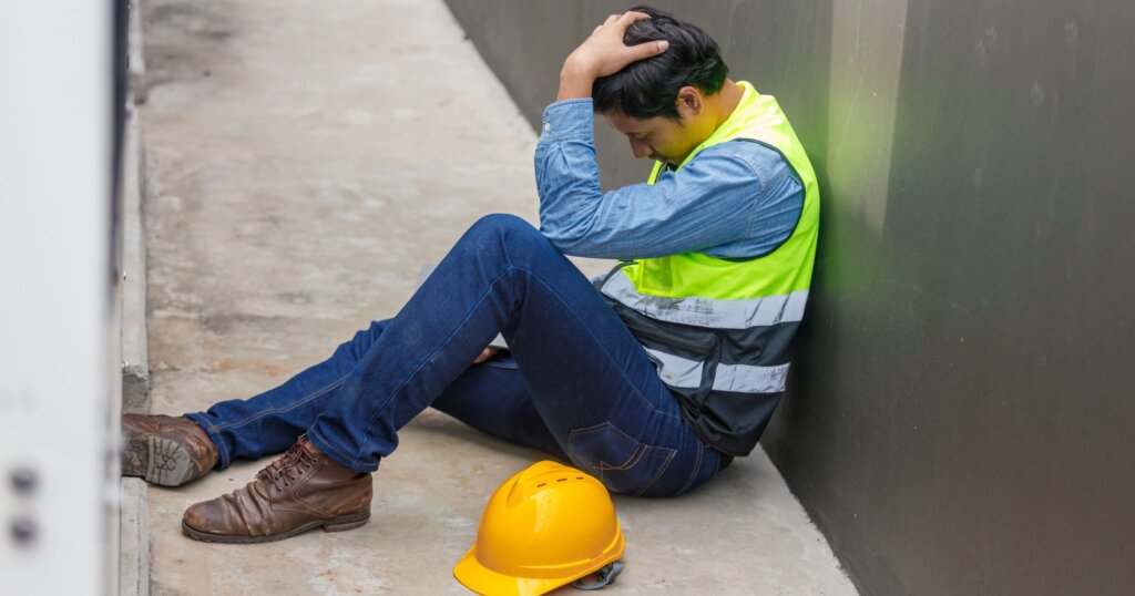 Workplace loneliness with worker tired and alone