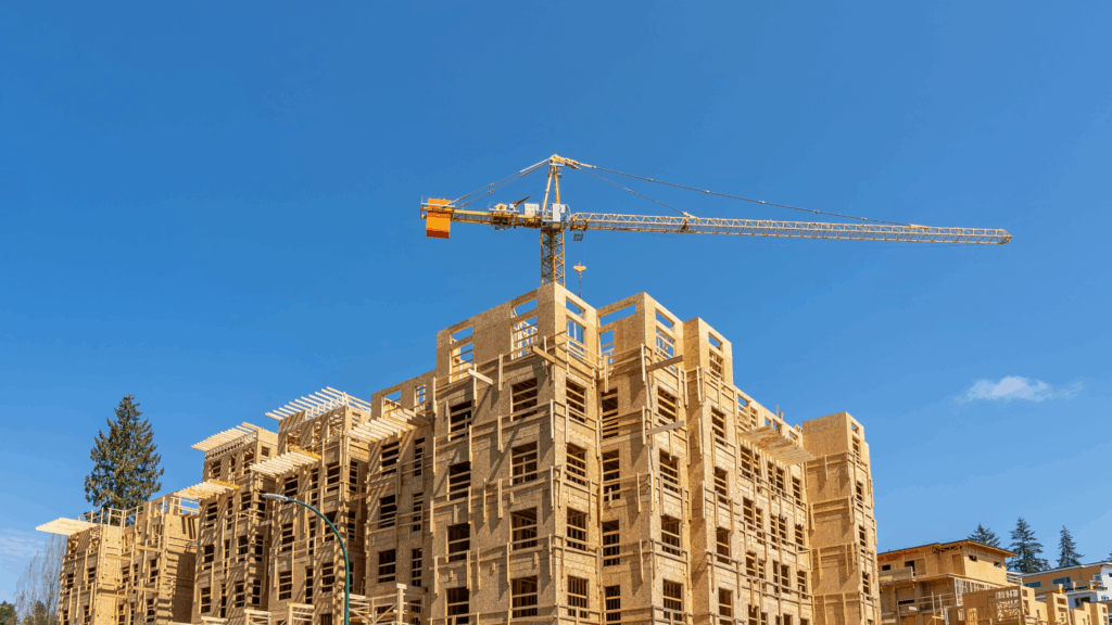 Wood-frame apartment complex; the design and structural material affects the cost to build an apartment complex