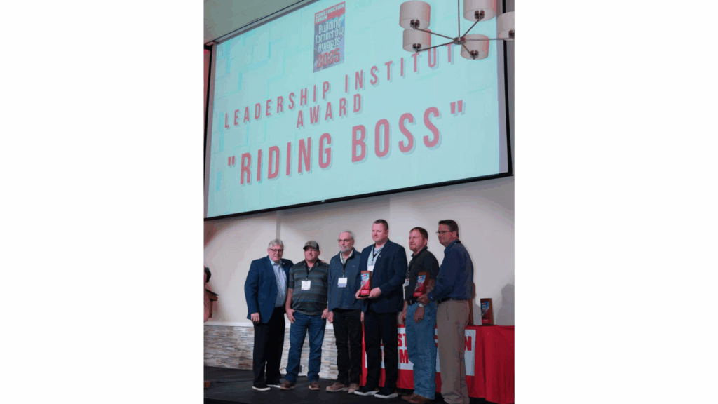 John Sr., presenting the Leadership Institute Award for "Riding Boss," a collaborative program between the Mason Contractors Association of St. Louis and Bricklayers and Allied Crafts Administrative District Council to prevent suicide and provide support within their industry.