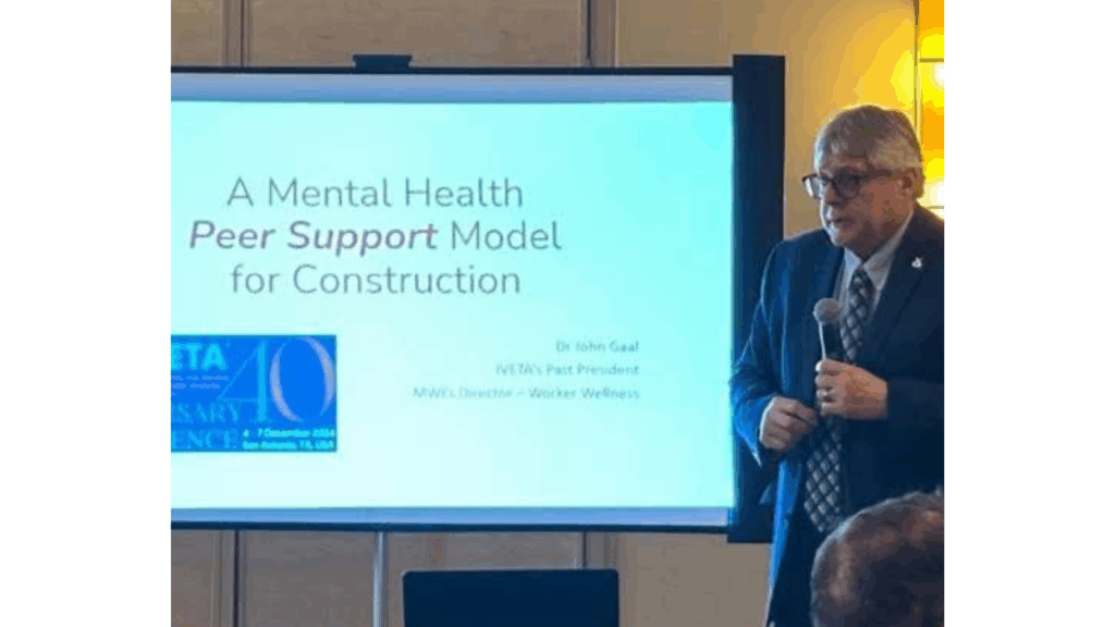 John Sr. presenting on the peer support model in construction for the prevention of suicide. 