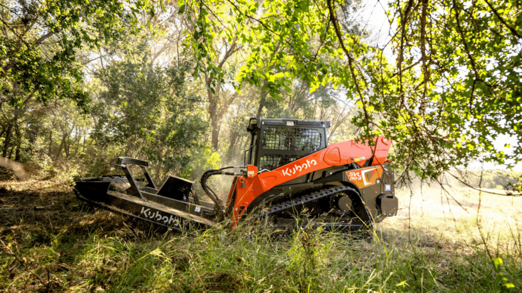 Kubota SVL110-3 with attachment for land clearing