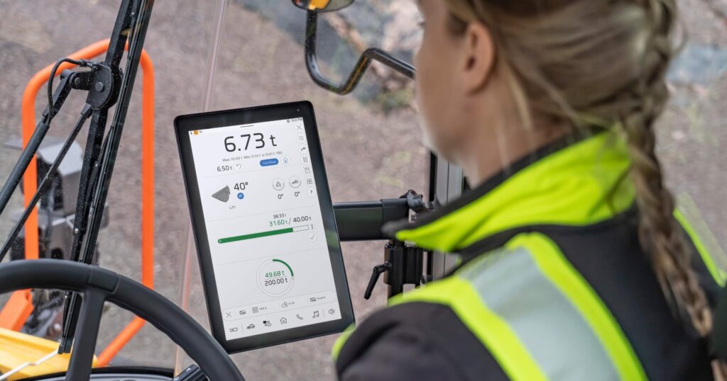 Volvo CE onboard display showing certified on-board weighing system for real-time load measurement.