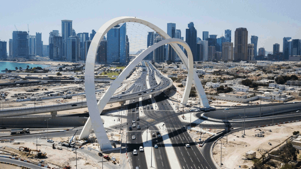 The Al Wahda Arches rise above one of Doha’s busiest corridors, blending structural engineering with landmark design to redefine the city’s urban gateway.