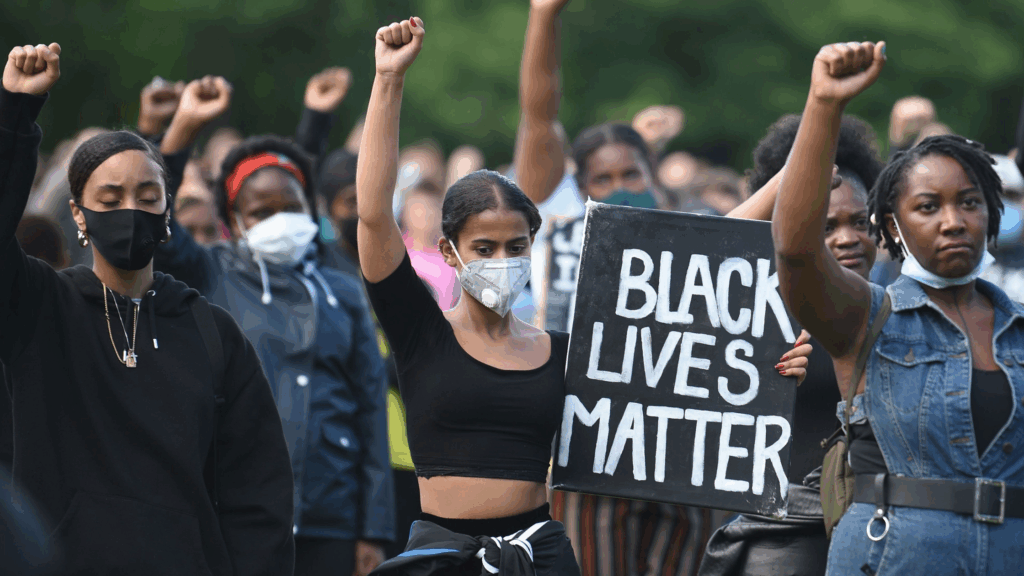 BLM protest in Asheville NC where the city previously voted to provide reparations to its Black community in the form of investments in areas where Black residents face inequality. Photo courtesy of Al Dia