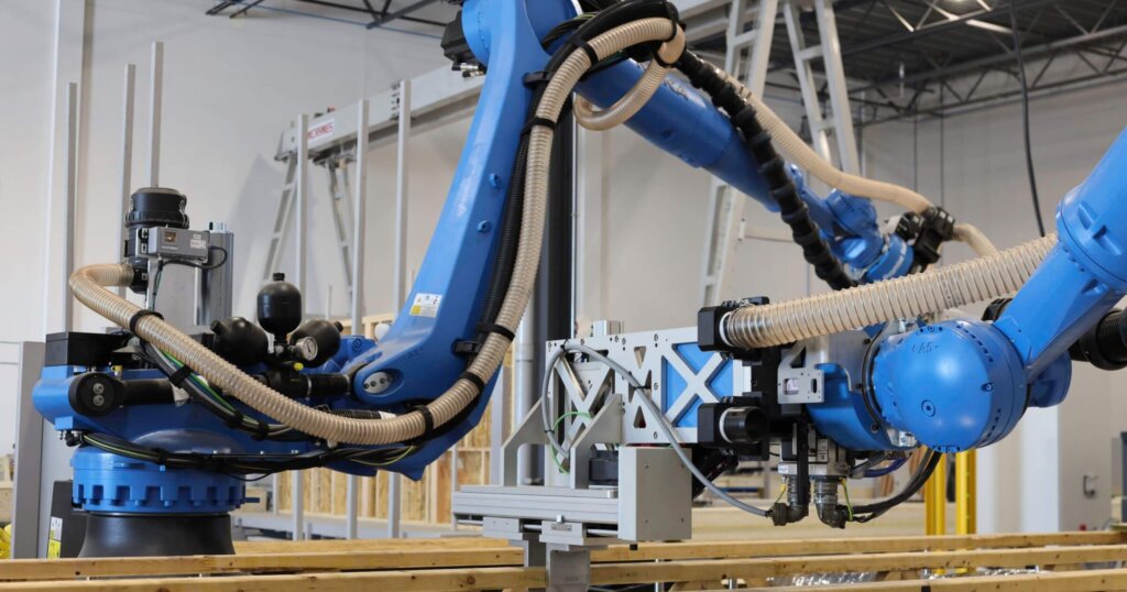 Promise robotics homebuilding robot in a factory.