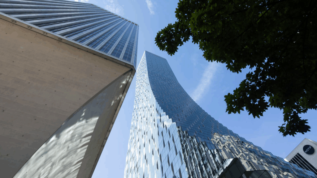 Rainier Square Tower pioneers a steel plate shear wall system, accelerating construction timelines and redefining how high-rise cores are built in seismic zones.
