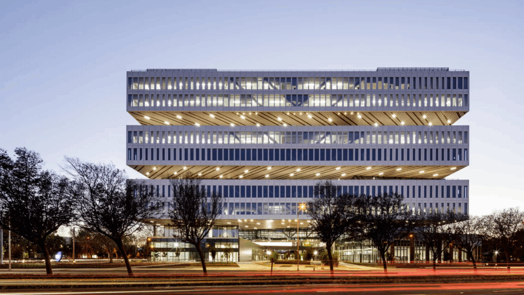 Samsung’s headquarters uses a central courtyard and intentional circulation paths to drive interaction, showing how office design is evolving to shape behavior, not just house it.