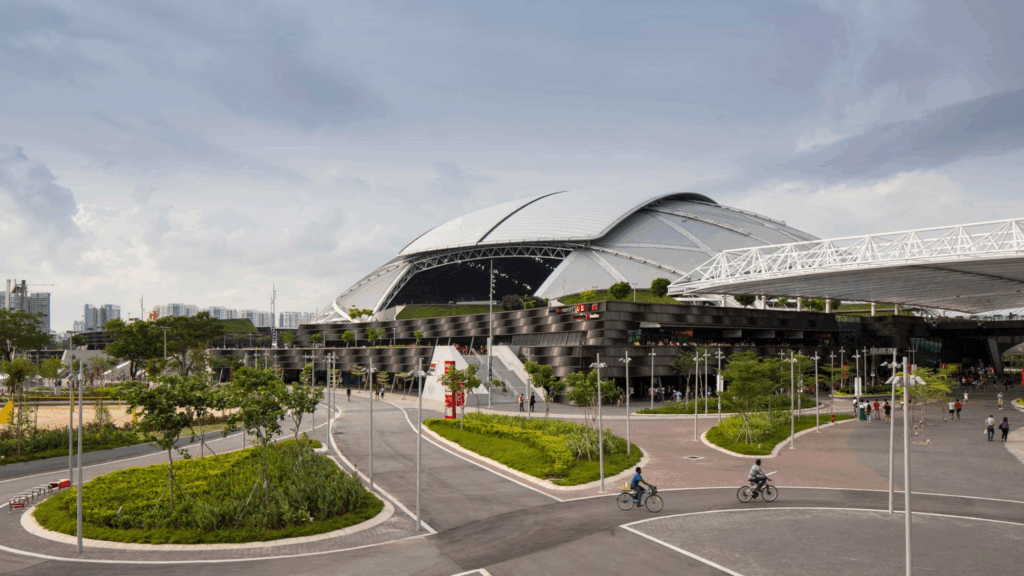 The Singapore Sports Hub brings multiple venues, public spaces, and transit together into one integrated development—highlighting how modern stadiums are built for both events and everyday use.
