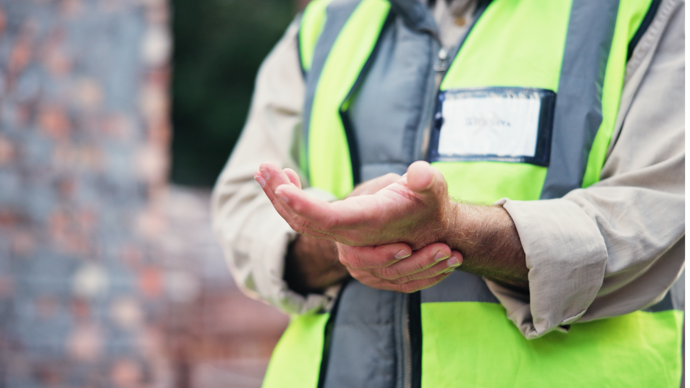 Construction worker with repetitive strain injury in wrist