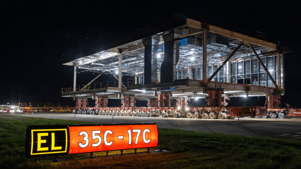 Inside HOK: 10 projects redefining the built environment 9 DFW Airport Terminal C Pier Expansion being moved to the site on wheels