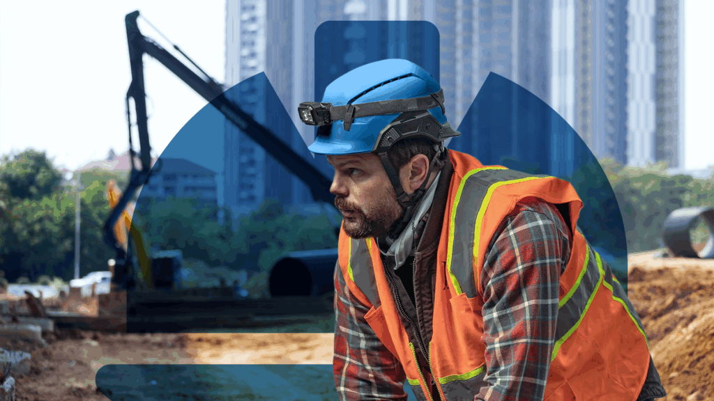 Construction worker with a safety helmet on site to prevent injuries.