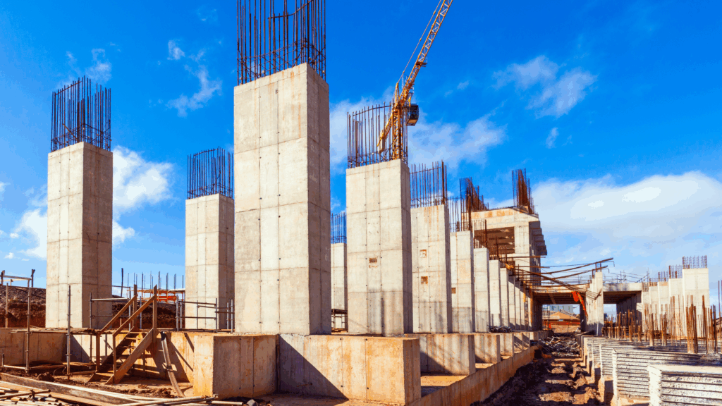 Civil and infrastructure types of construction projects; reinforced concrete columns and rebar framework during early foundation work