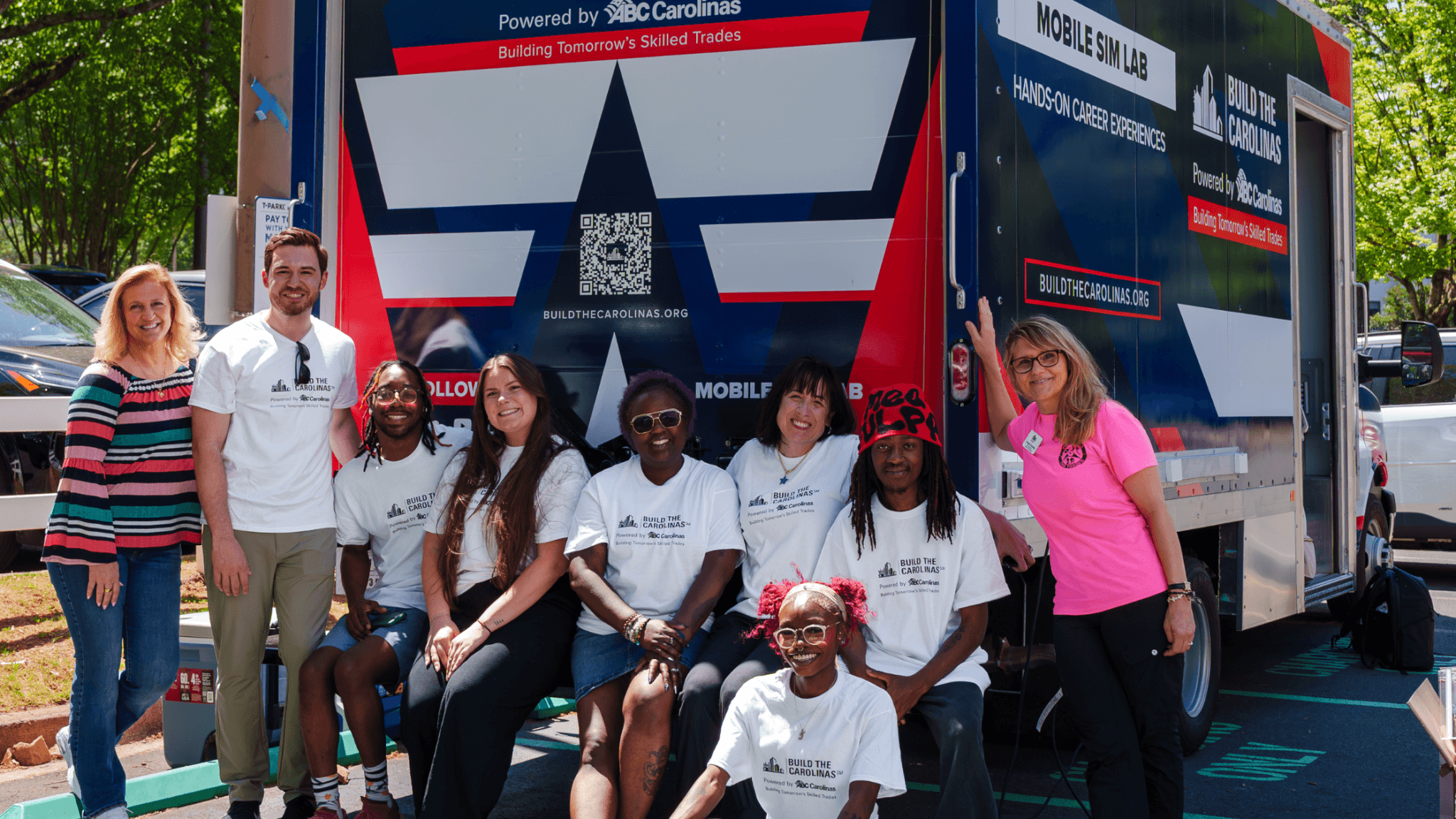 Students in front of mobile sim van
